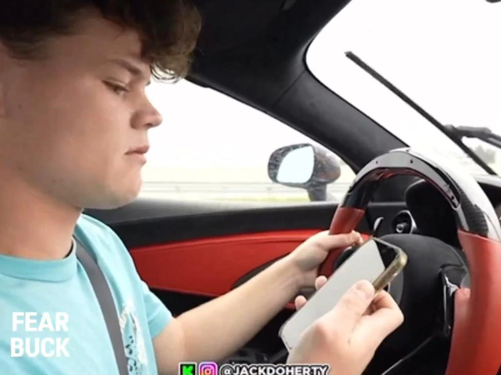 YouTuber Jack Doherty Crashes McLaren While Streaming: What Happened? 2 Jack Doherty car crash because he was using his phone while driving in rainy, wet road. (Image Credit: X / Twitter)