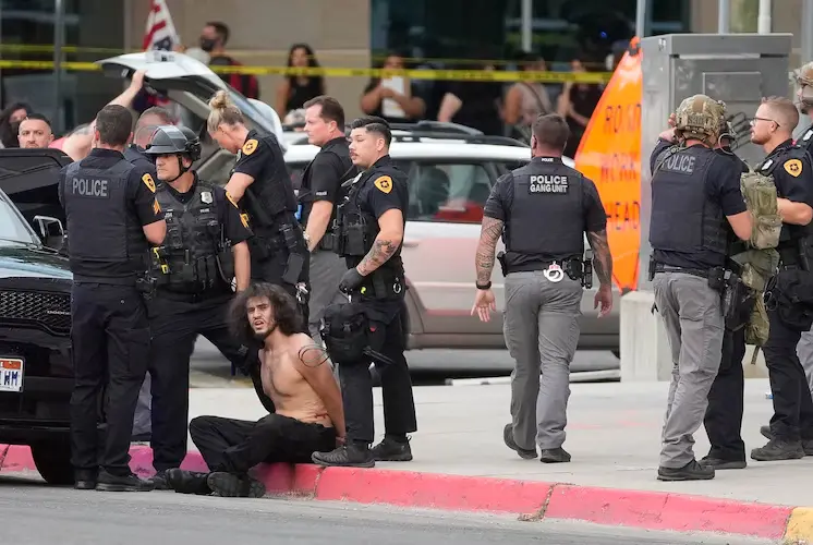 Salt Lake City Shooting During No Kings Protest: What We Know 2 the suspect was apprehended shortly after a reported shooting during a demonstration in downtown Salt Lake City on Saturday, June 14, 2025. (Image Credit: Francisco Kjolseth / The Salt Lake Tribune)