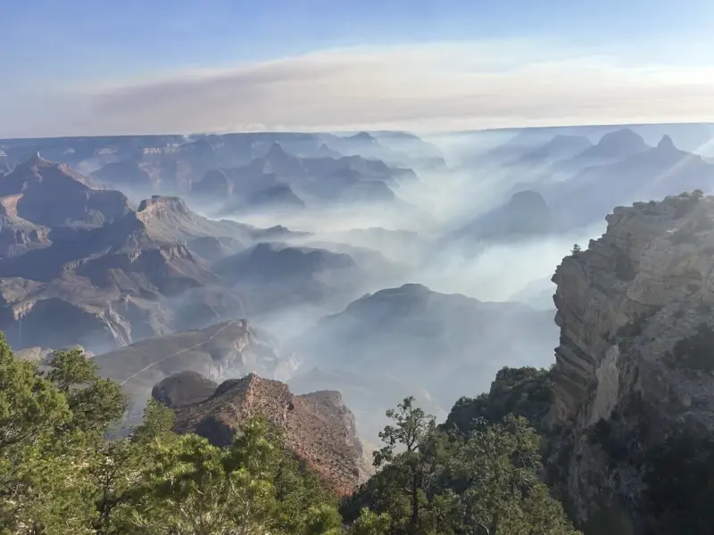 Historic Grand Canyon Lodge Destroyed by Dragon Bravo Wildfire 1 Smoke from wildfires settles over Grand Canyon National Park in northern Arizona on Friday, July 11, 2025. (Image Source: Joelle Baird/Grand Canyon National Park)