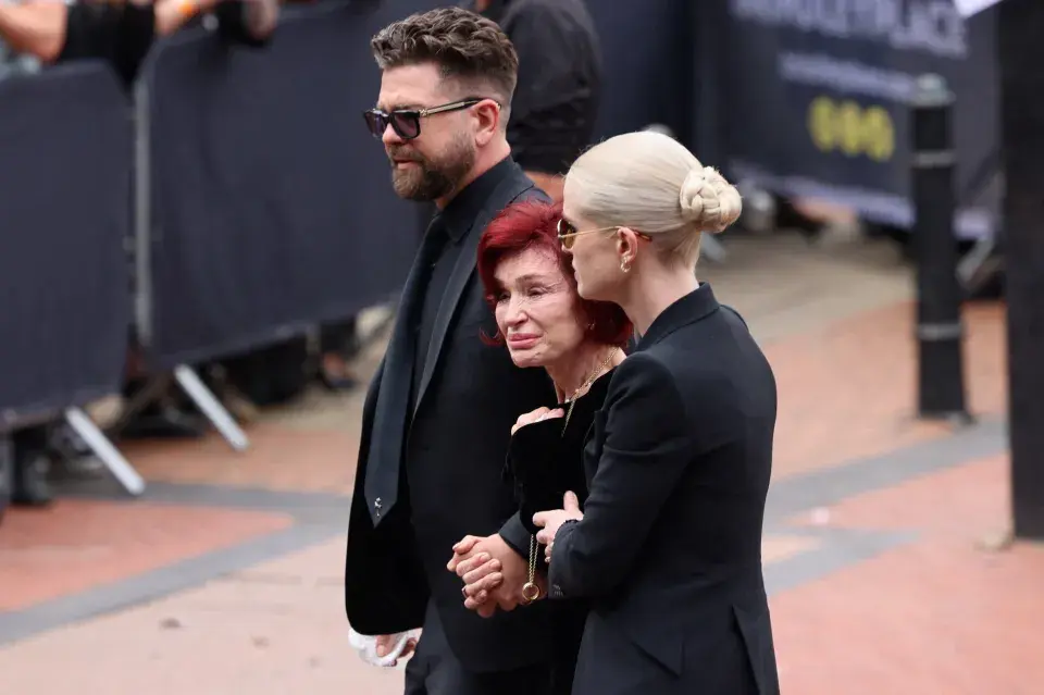 Thousands Gathered at Ozzy Osbourne Funeral Procession Through Birmingham 1 Sharon Osbourne (middle) with her daughter Kelly and son Jack at Ozzy Osbourne funeral procession. (Image Credit: Reuters)